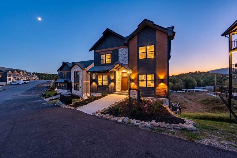 Luxury cabin lit at dusk in the Smoky Mountains